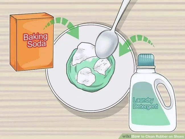 Pouring dish soap into a tray of warm water for soaking soles