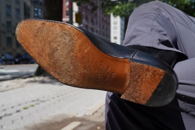A Dainite-style studded rubber sole on a pair of boots
