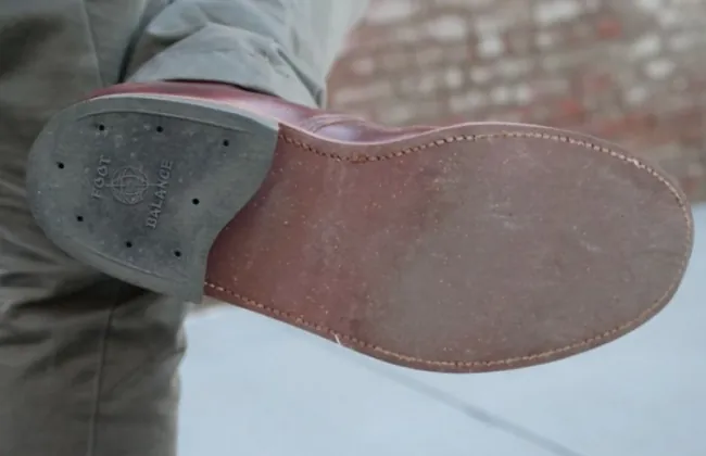 A leather sole fitted with a thin rubber half-sole to take the abrasion