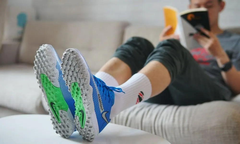 New football boots being worn gently during the break-in period