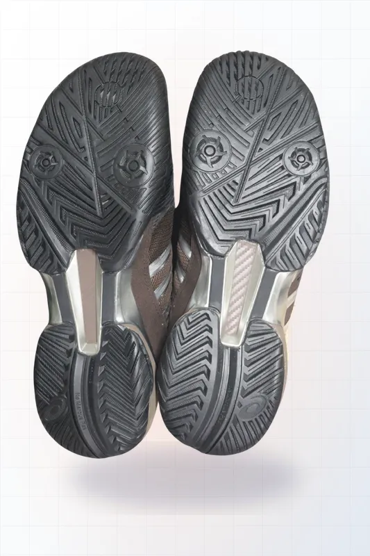 Sneakers with worn sole — Pickleball sole capping (after)