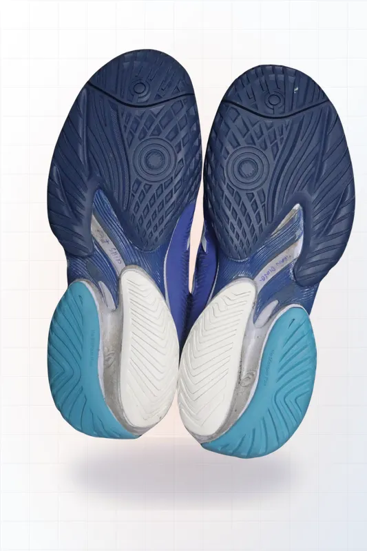 Sneakers with worn sole — Pickleball sole capping (after)