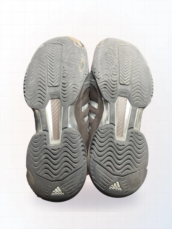 Sneakers with worn sole — Pickleball sole capping (before)