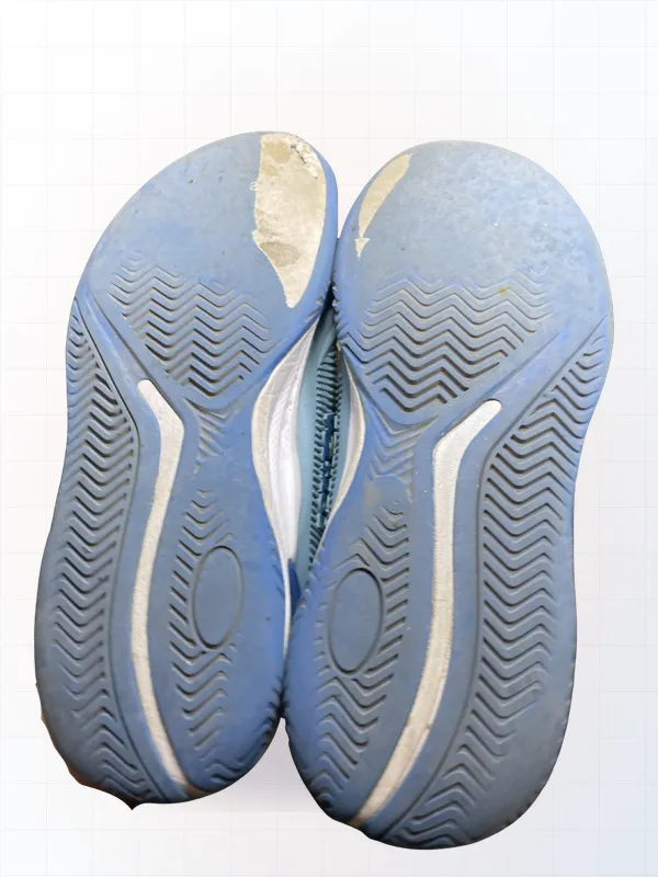 Sneakers with worn sole — Pickleball sole capping (before)