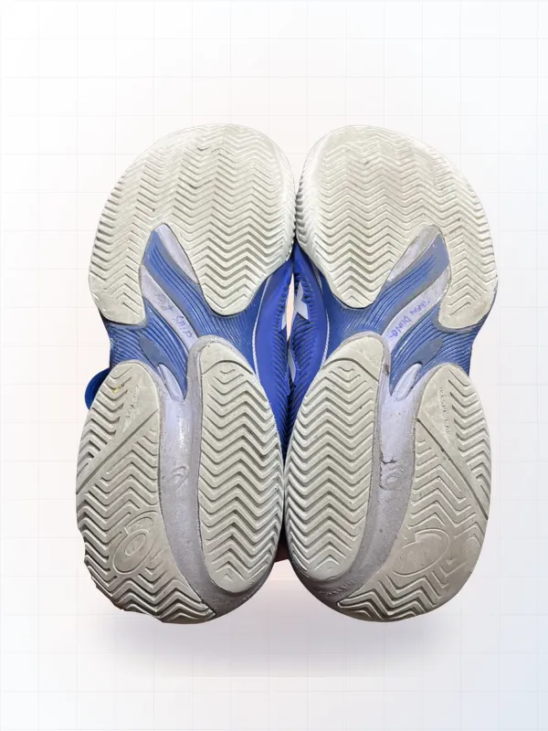 Sneakers with worn sole — Pickleball sole capping (before)
