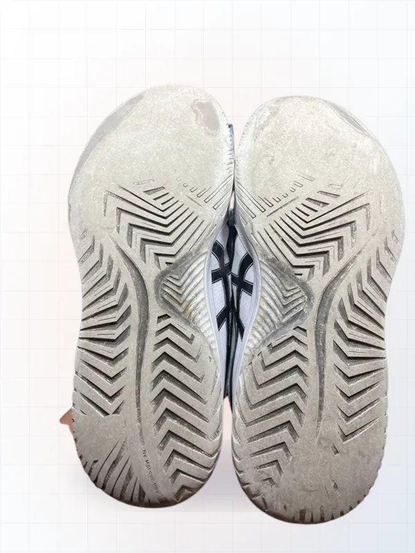 Sneakers with worn sole — Pickleball sole capping (before)