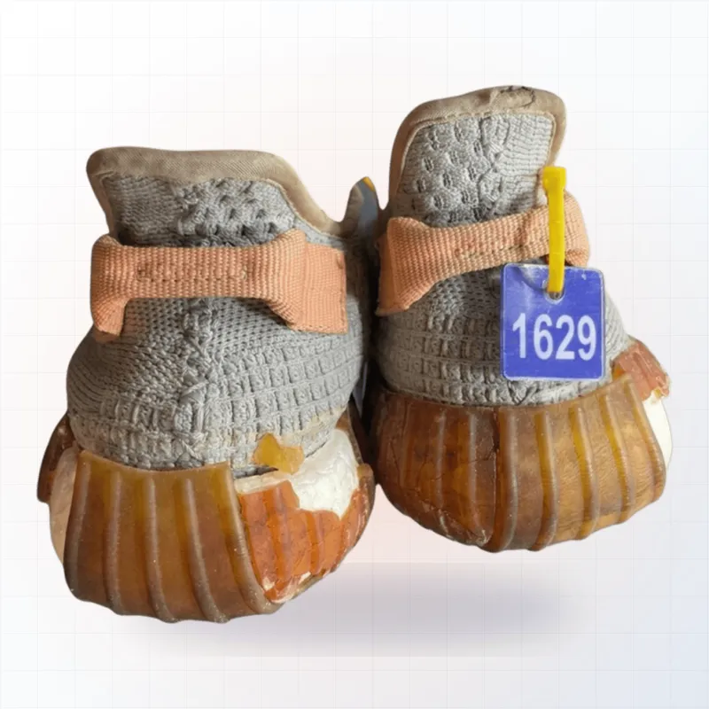 Adidas with worn sole — Full sole replacement (before)